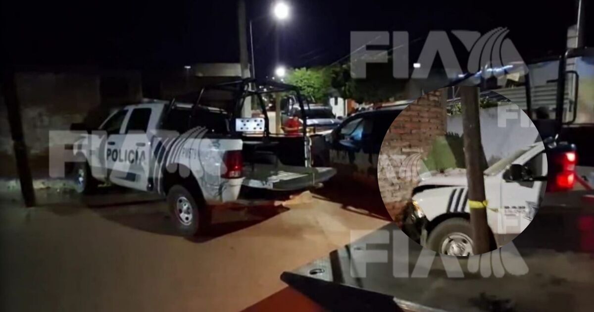 Choque entre patrullas en Mazatlán: policías colisionan y derriban un portón